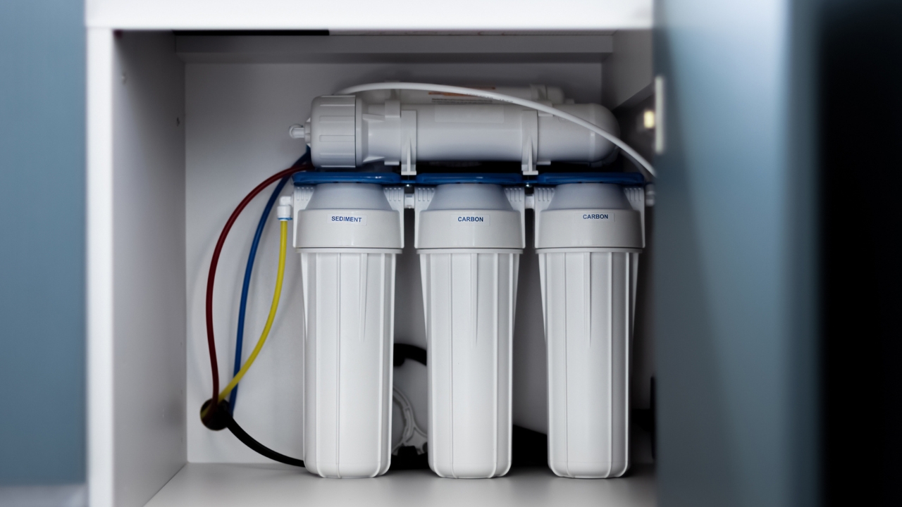 Under-sink reverse osmosis water filtration system installed by Charter Oak Plumbing for clean drinking water.
